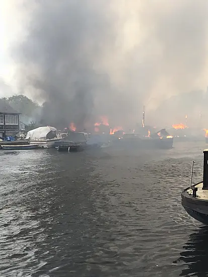 Dozens Of Firefighters Tackle Blaze On Island In River Thames