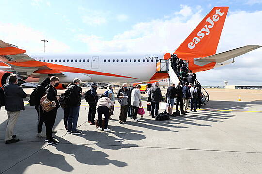 In Pictures: Uk Travellers Take To The Skies As Road Map Restores Old Freedoms