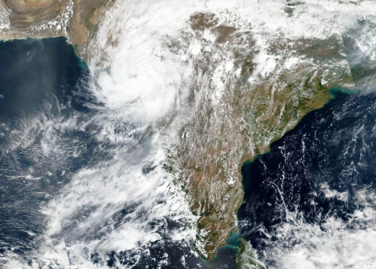 India Continues To Search For Missing After Barge Sinks During Cyclone