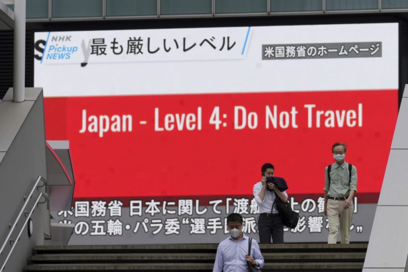 Japan To Extend Virus Emergency In Tokyo Weeks Before Olympics Open