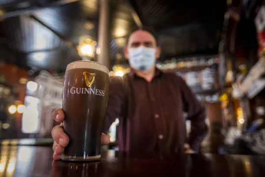 'It Was Madness': Thousands Flock To Northern Ireland's Reopened Pubs