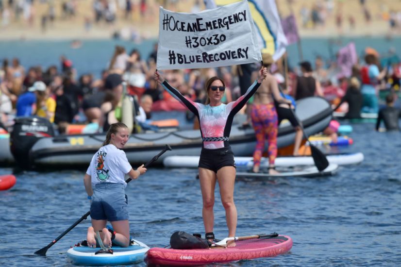 Protesters Take To Canoes And Surfboards To Urge G7 Leaders To Save Seas