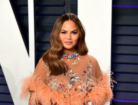 Chrissy Teigen Threatens Legal Action Against Fashion Designer In Bullying Row