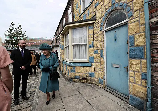 Britain's Queen Pays Visit To Set Of Coronation Street