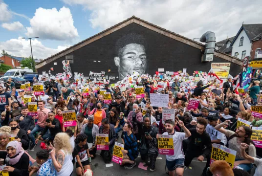 Hundreds Of People Take The Knee Beside Recently-Repaired Rashford Mural