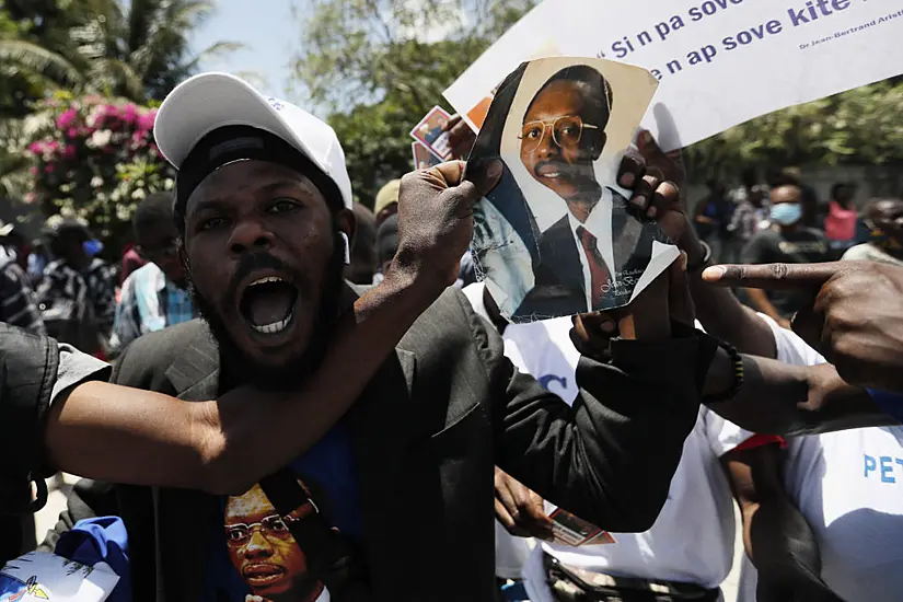 Hundreds Greet Aristide On Returns To Troubled Haiti