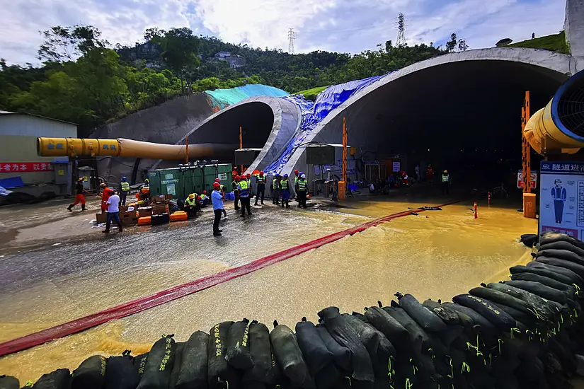 Divers Join Search For 14 People In Flooded Tunnel In China