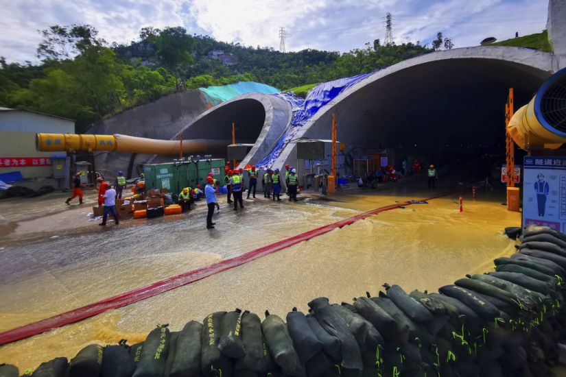 Divers Join Search For 14 People In Flooded Tunnel In China