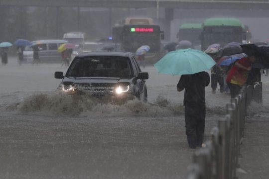 Chinese Military Blasts Dam To Divert Deadly Floodwaters