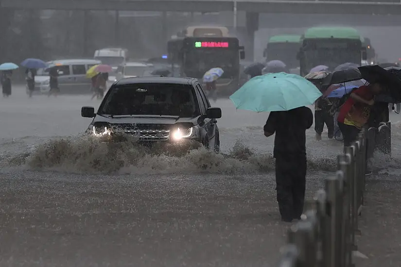 Chinese Military Blasts Dam To Divert Deadly Floodwaters