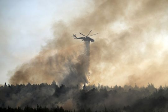 Firefighting Planes Resume Flights Over Wildfire North Of Athens