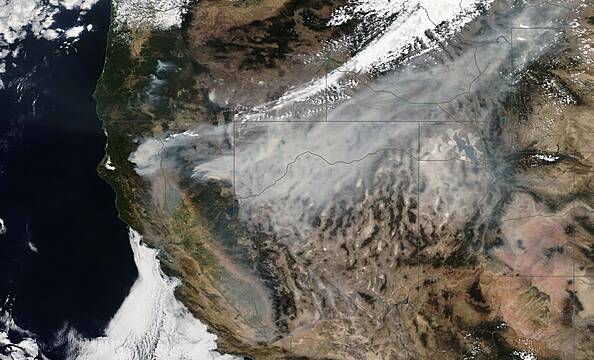 Nearly 900 Buildings Destroyed By Massive California Fire