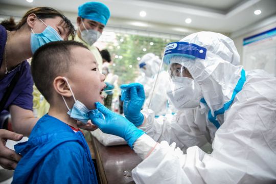 China Keeps Guard Up As Covid Outbreak Enters Fourth Week