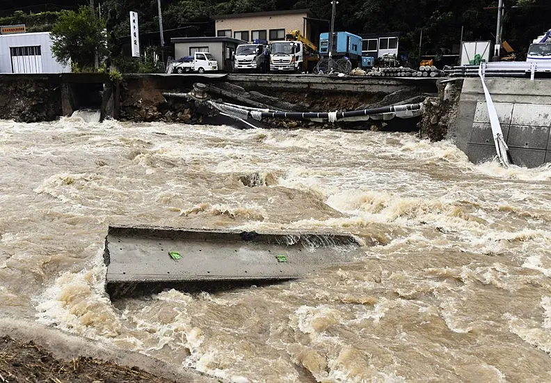 Heavy Rainfall Triggers Deadly Mudslide In Japan