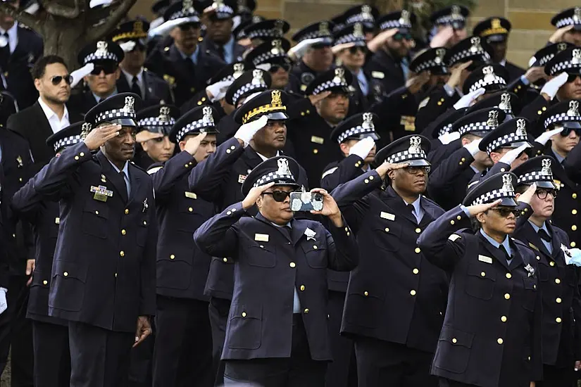 Officers Stand To Attention As Murdered Chicago Policewoman Is Laid To Rest