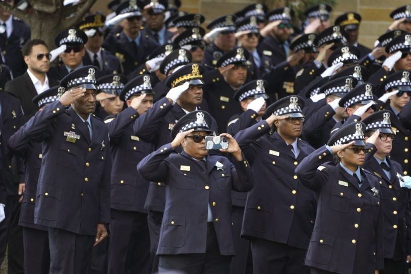Officers Stand To Attention As Murdered Chicago Policewoman Is Laid To Rest