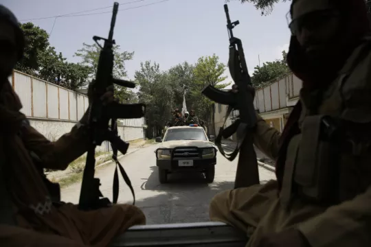 Taliban Co-Founder In Kabul To Hammer Out New Government As Airport Chaos Grows