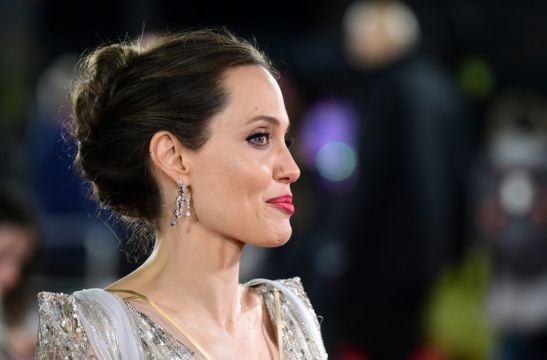 Angelina Jolie Makes Instagram Debut With Post About Afghan Girl