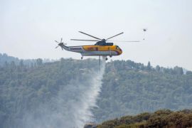 California Firefighters Battle A Dozen Large Wildfires