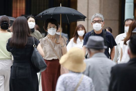 Japan To Expand Virus Emergency Areas As Cases Rise