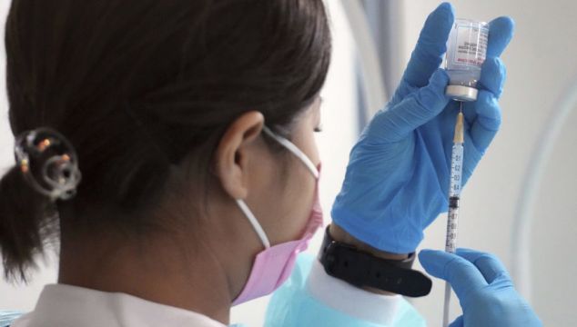 Japan Suspends 1.63M Doses Of Moderna Vaccine Over Contamination