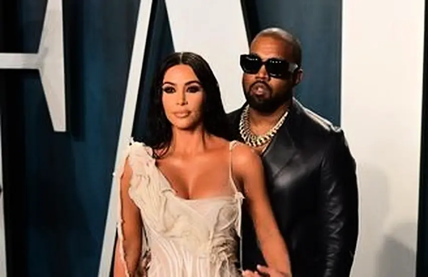 Kanye West Joined By Wedding Dress-Wearing Kim Kardashian At Donda Launch Event