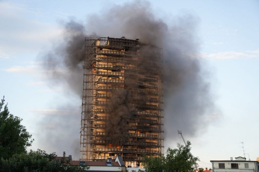 Fire Crews Battle Blaze At Residential Tower Block In Italy