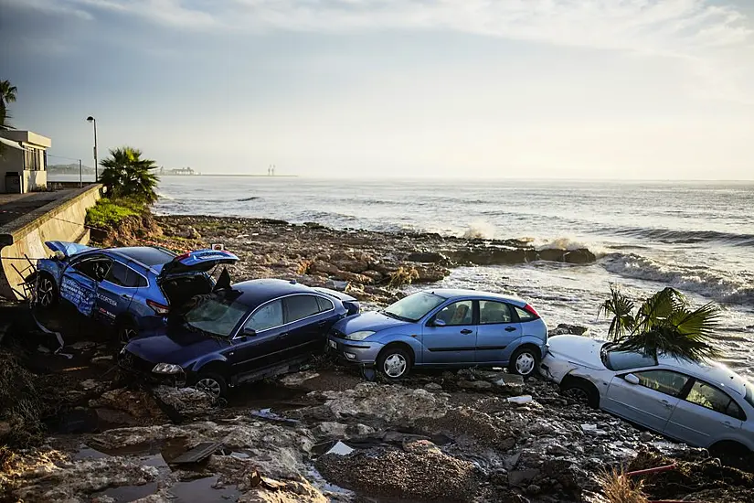 Flooding Sweeps Cars Into Sea In North-East Spain