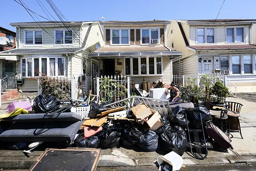 Huge Clean-Up Takes Place After Dozens Killed In Us Floods