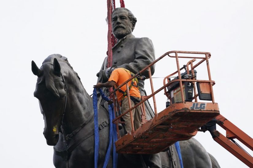 Statue Of Confederate General Lee Removed From Virginia Pedestal
