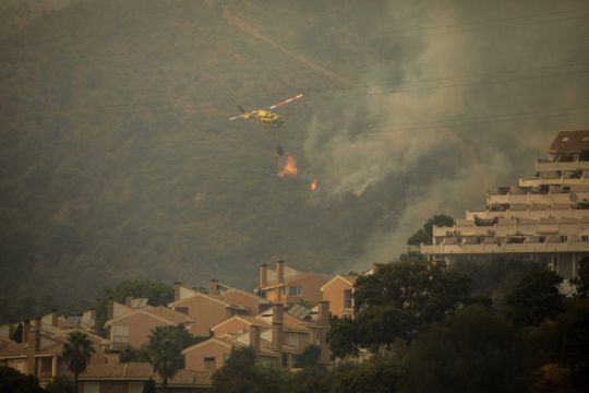 Wildfire In Spain Kills Firefighter, Forces Evacuations And Shuts Motorway