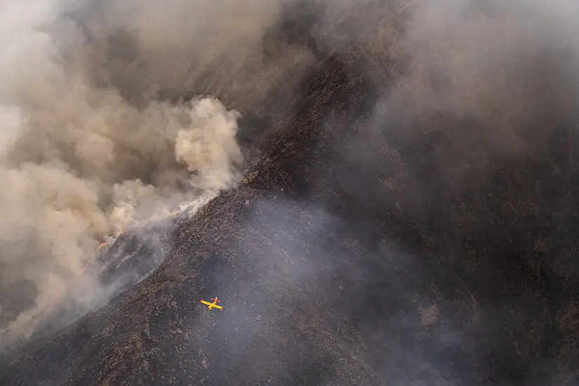 Rainfall Helps Firefighters Control Inferno In Southern Spain