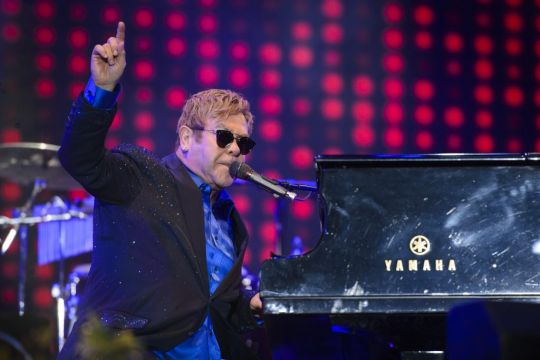 Elton John Announces Rescheduled Tour Dates With ‘Sadness And A Heavy Heart’