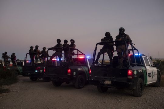 Mexican Forces Surround Border Migrant Camp