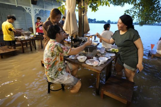 Diners Flock To Water-Logged Thai Riverside Restaurant
