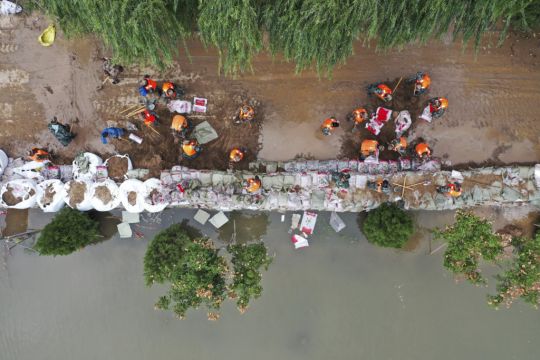Several Missing After Deadly Bus Plunge During Chinese Floods