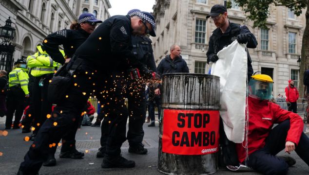Protesters Erect Statue Of Boris Johnson Splattered In Oil Outside Downing Street