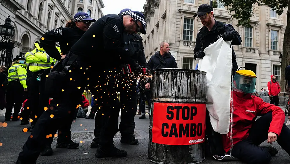 Protesters Erect Statue Of Boris Johnson Splattered In Oil Outside Downing Street