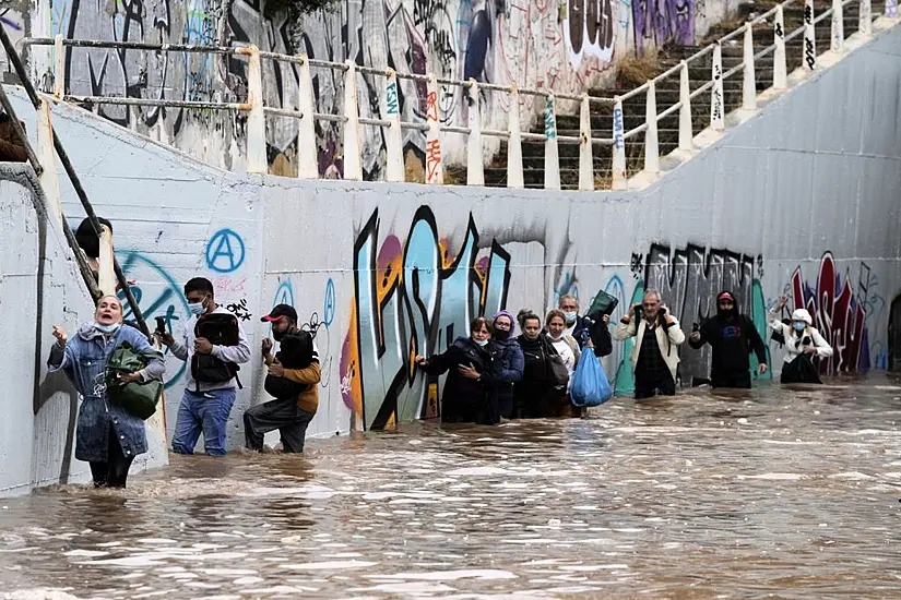 Homes Flooded As Storms Batter Athens And Fire-Hit Greek Island