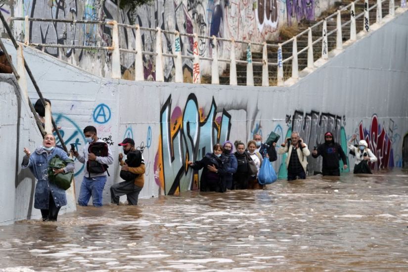 Homes Flooded As Storms Batter Athens And Fire-Hit Greek Island