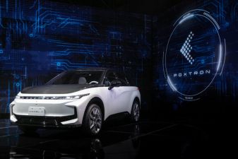 Tech Giant Foxconn Unveils Electric Vehicles As It Prepares To Enter Car Market