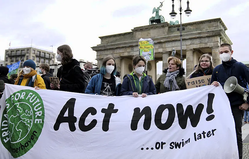 Campaigners Stage Climate Protests Across Continents