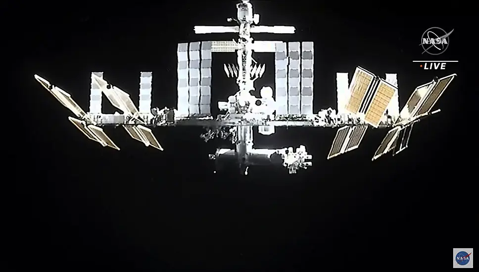 Space Station Astronauts Head To Capsules To Avoid Space Junk