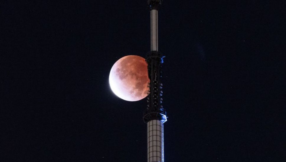 Partial Lunar Eclipse Dubbed 'Blood Moon' Dazzles Night Skies