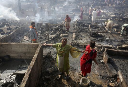 Fire Guts 100 Huts In Karachi Slum