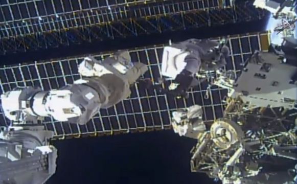 Spacewalking Astronauts Avoid Debris As They Repair Antenna