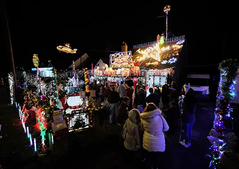 Couple Raises Money For Charity With Elaborate Christmas Lights Display