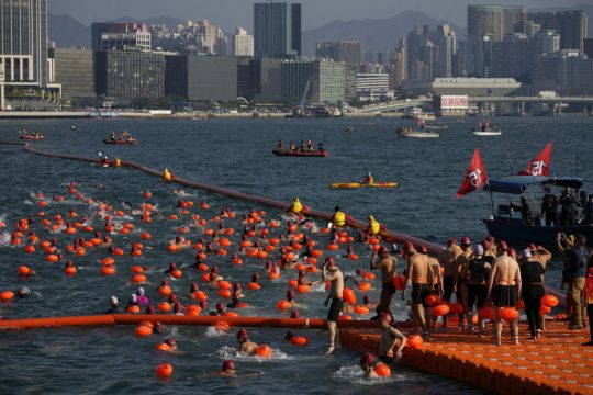 Swimmers Race Across Hong Kong’s Victoria Bay