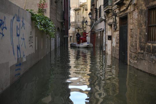 Swollen Rivers Flood Streets In Spain Leaving At Least One Person Dead