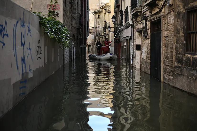 Swollen Rivers Flood Streets In Spain Leaving At Least One Person Dead